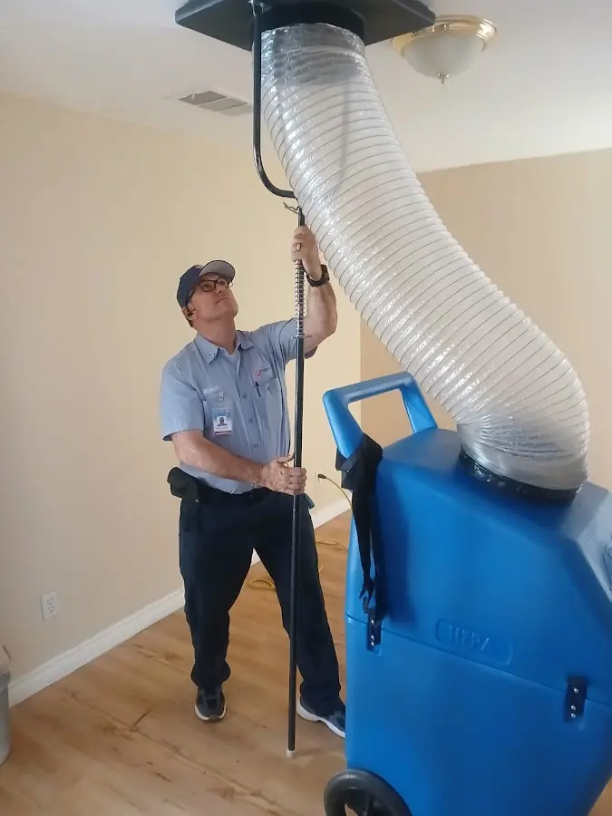 HVAC Installation technician using HEPA equipment in Triangle